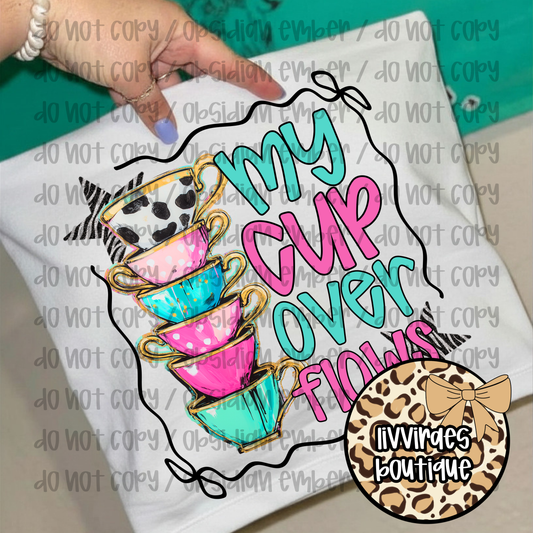 My Cup Overflows Tee — Colorful Stacked Teacups Graphic Shirt